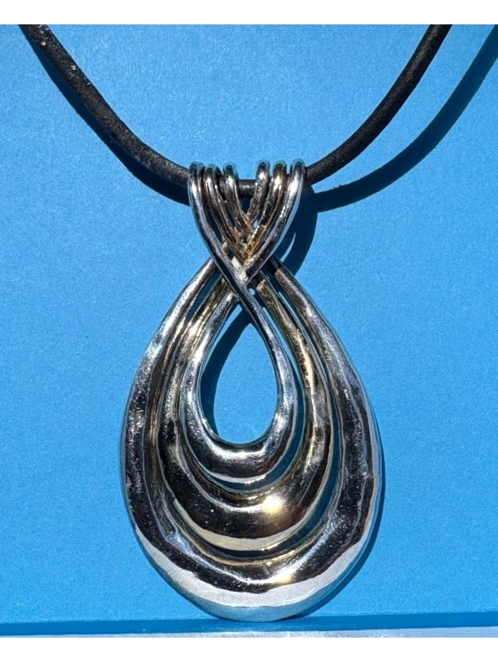 Modern Silver and Gold Tone Pendant Necklace on Black Leather Cord with Clasp